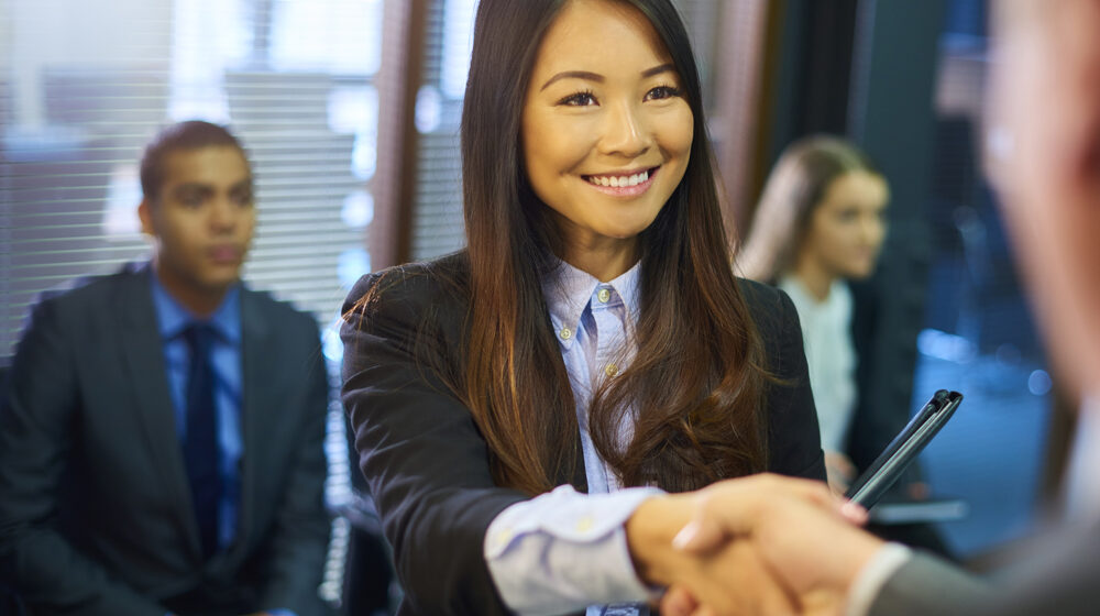 Woman shaking hands