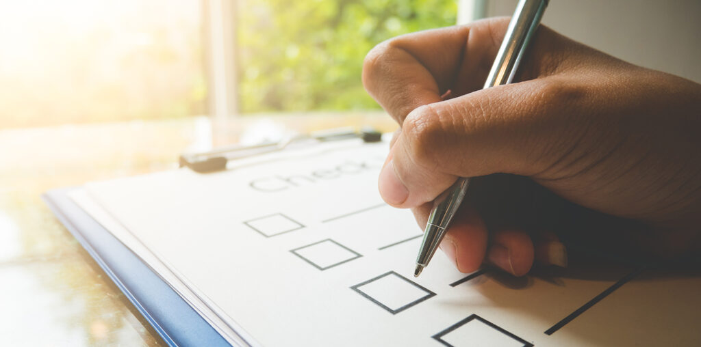 Hand writing on checklist