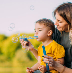 Mother and son on lake