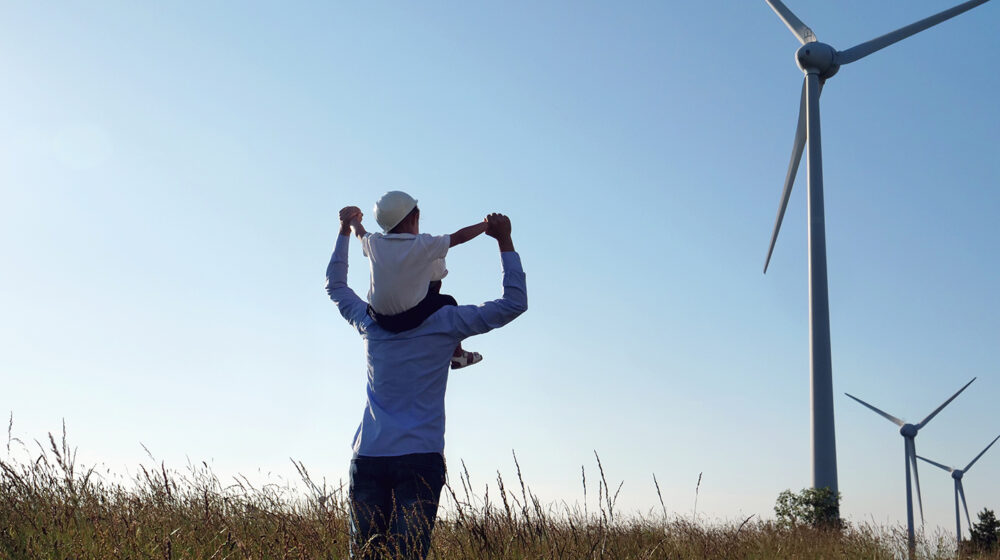 Father and son at windmill