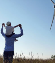 Father and son at windmill