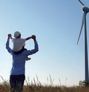 Father and son at windmill