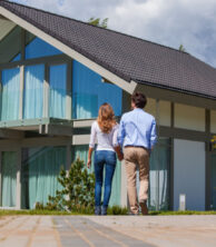 Couple outside of house