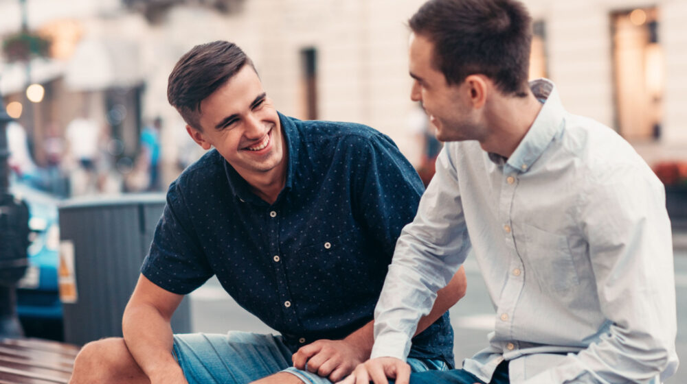 Two people laughing