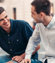 Two people laughing