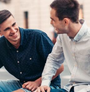 Two people laughing