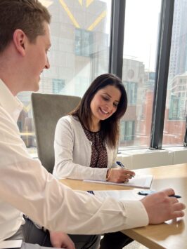 Two Fiduciary Trust colleagues in a meeting