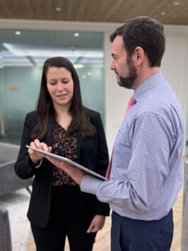 Two Custody Team members having a conversation