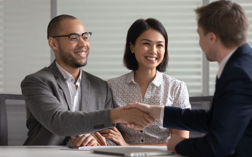 Man and woman with financial advisor